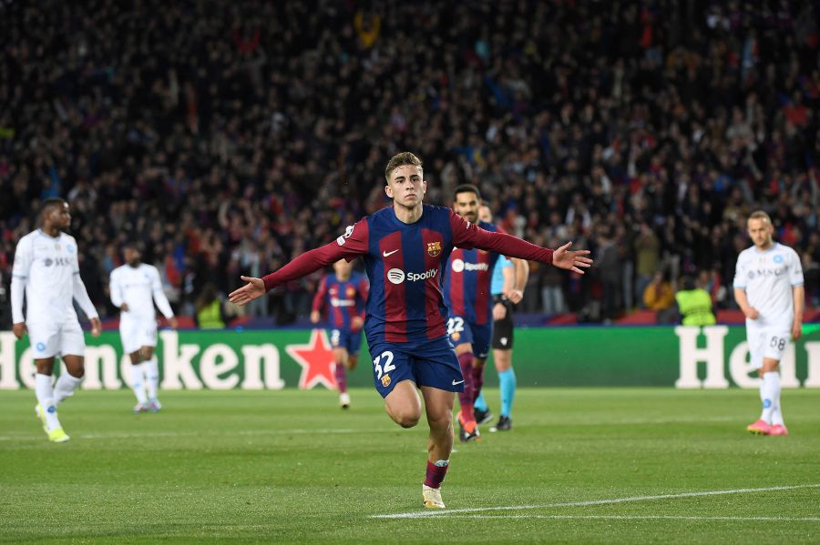 Barcelona's Spanish midfielder #32 Fermin Lopez celebrates scoring the opening goal during the UEFA Champions League last 16 second leg football match between FC Barcelona and SSC Napoli on March 12, 2024. - AFP Pic
