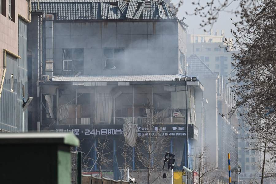This photo shows a general view of a damaged building at the scene of a suspected gas explosion in Sanhe, in China’s northern Hebei province on March 13, 2024. A huge suspected gas explosion at a restaurant killed one person and injured 22 more in northern China's Hebei province during rush hour on March 13, state media reported, causing severe damage to buildings.- AFP pic