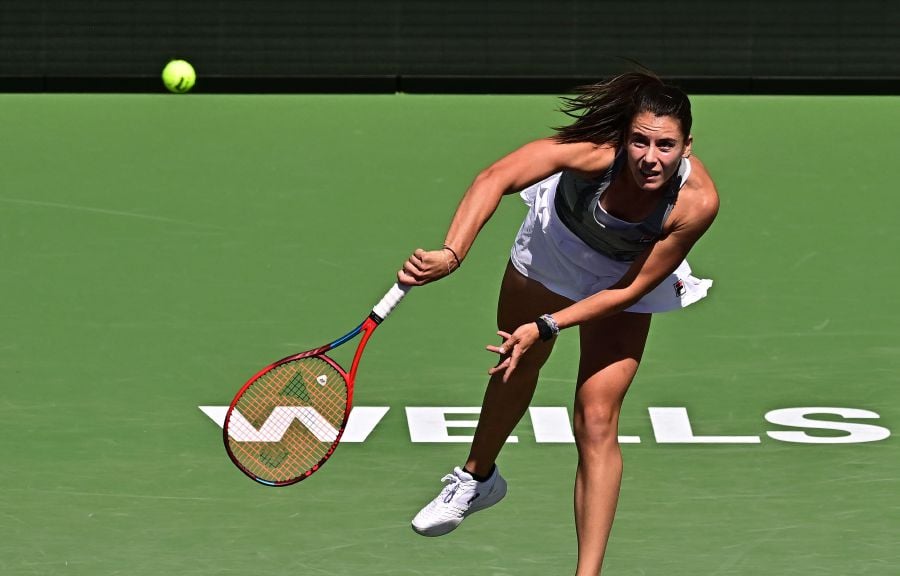 USA's Emma Navarro serves to Belarus's Aryna Sabalenka during their ATP-WTA Indian Wells Masters women's round of 16 tennis match at the Indian Wells Tennis Garden on March 13, 2024. - AFP pic