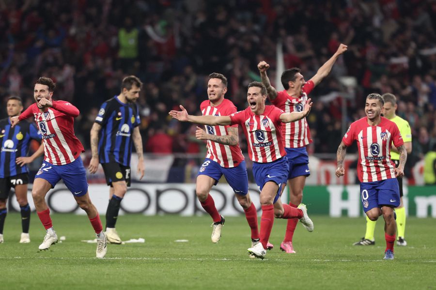 Atletico Madrid's players celebrate victory at the end of the UEFA Champions League last 16 second leg football match between Club Atletico de Madrid and Inter Milan on March 13, 2024. - AFP pic