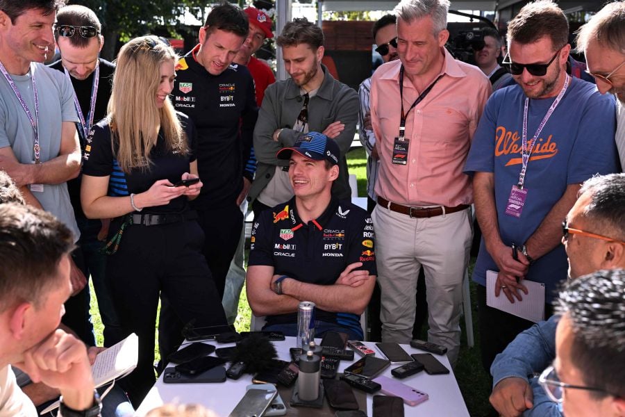 Red Bull Racing's Dutch driver Max Verstappen (C) speaks to the media at the Albert Park Circuit as Formula One teams prepare ahead of 2024 Formula One Australian Grand Prix, in Melbourne on March 21, 2024. - AFP pic
