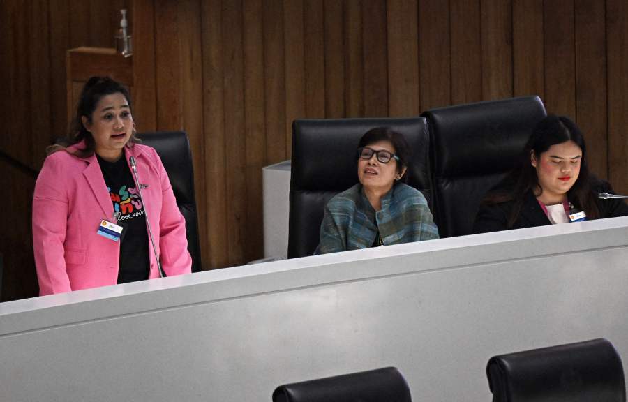 LGBTQI+ gender rights activist Ann Waddao Chumaporn (L) speaks during the first reading of the bill to legalise same-sex marriage by Thai senators next to activist and representative of the bill Chanya Rattanatada (R) at Parliament in Bangkok on April 2, 2023. - AFP pic