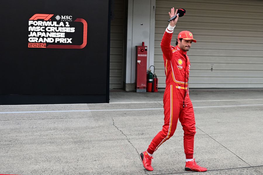 Ferrari's Spanish driver Carlos Sainz Jr gestures after finishing third in the Formula One Japanese Grand Prix race at the Suzuka circuit in Suzuka, Mie prefecture on April 7, 2024. - AFP pic