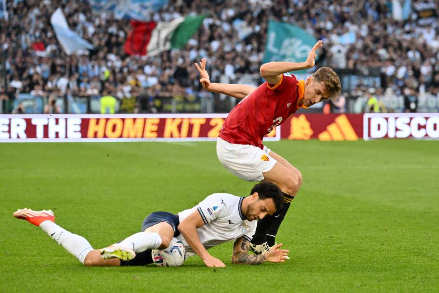 Roma's Spanish defender #14 Diego Llorente fights for the ball with Lazio's Brazilian midfielder #07 Felipe Anderson during the Italian Serie A football match between AS Roma and Lazio on April 6, 2024 at the Olympic stadium in Rome.- AFP pic