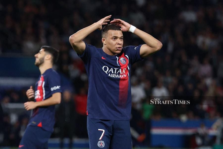 Paris Saint-Germain's Kylian Mbappe reacts after missing a goal opportunity during the Ligue 1 match against Clermont at the Parc des Princes Stadium in Paris on April 6. AFP PIC