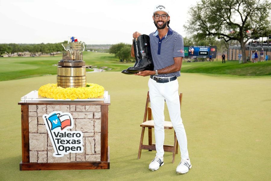 Akshay Bhatia of the United States poses with the trophy after winning the Valero Texas Open on the 18th hole of the first playoff during the final round of the Valero Texas Open at TPC San Antonio on April 07, 2024. - AFP pic