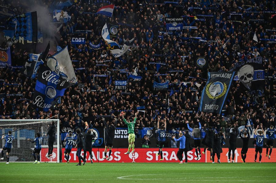 Atalanta's players celebrate with fans after winning the UEFA Europa League quarter-final second leg football match between Atalanta BC and Liverpool FC at the Atleti Azzurri d'Italia Stadium in Bergamo, on April 18, 2024. Liverpool were knocked out of the Europa League by Atalanta with the Italian side reaching the semi-finals 3-1 on aggregate on April 18, 2024. - AFP pic