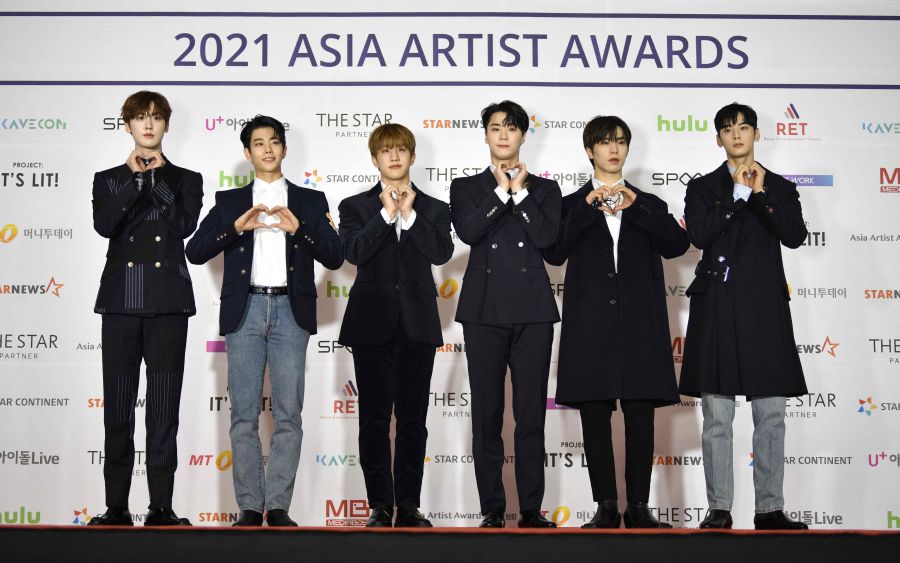 This picture taken on December 2, 2021 shows members of K-pop boy band Astro attending a red carpet event of the Asia Artist Awards in Seoul. - AFP Pic