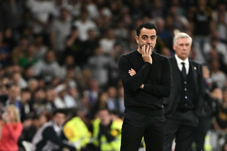 Barcelona's Spanish coach Xavi looks on during the Spanish league football match between Real Madrid CF and FC Barcelona at the Santiago Bernabeu stadium in Madrid on April 21, 2024. Real Madrid won 3-2. - AFP pic