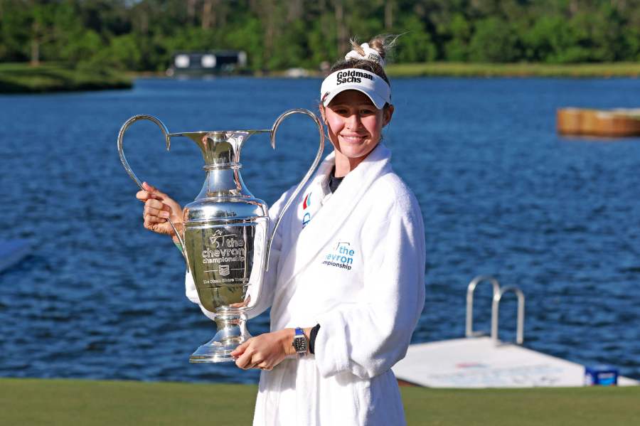 Nelly Korda of the United States celebrates with the trophy after winning The Chevron Championship at The Club at Carlton Woods on April 21, 2024 in The Woodlands, Texas. - AFP pic
