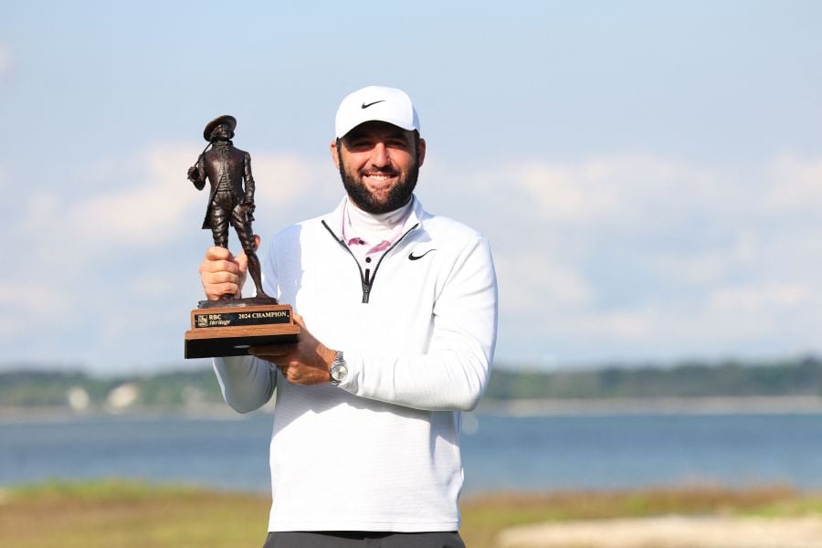 Scottie Scheffler of the United States celebrates with the trophy after winning during the continuation of the final round of the RBC Heritage at Harbour Town Golf Links on April 22, 2024. - AFP pic