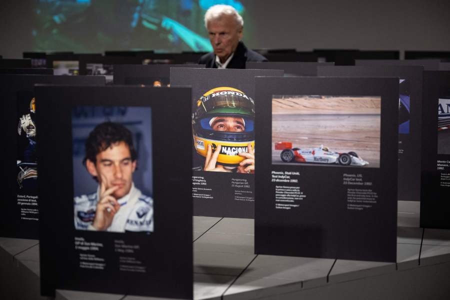 A man walks near a photograph of Ayrton Senna, taken by photographer Rainer Schlegelmilch, as he visits the "Ayrton Senna Forever" exhibition, paying tribute to the late Brazilian's F1 driver Ayrton Senna on the 30th anniversary of his death, at the "Museo dell'Automobile" (Mauto - National automobile museum), in Turin on April 23, 2024. - AFP pic