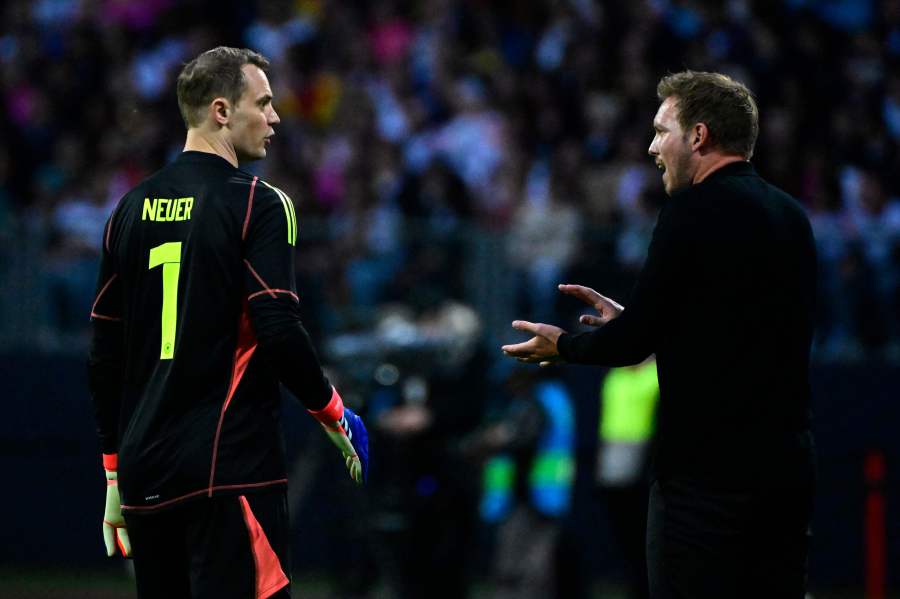 Germany's head coach Julian Nagelsmann talks to Germany's goalkeeper #01 Manuel Neuer during the friendly football match Germany v Ukraine, in Nuremberg, eastern Germany, on June 3, 2024. - AFP Pic