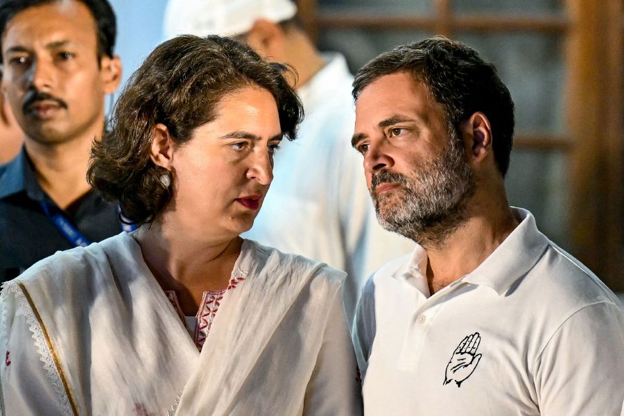 Leaders of Indian National Congress (INC) party Rahul Gandhi (R) speaks to his sister Priyanka Gandhi Vadra (C) during an address by party President Mallikarjun Kharge (not pictured), after a meeting of opposition alliance Indian National Developmental Inclusive Alliance (INDIA) bloc in New Delhi on June 5, 2024, on the following day of voting results for India's general election.- AFP PIC
