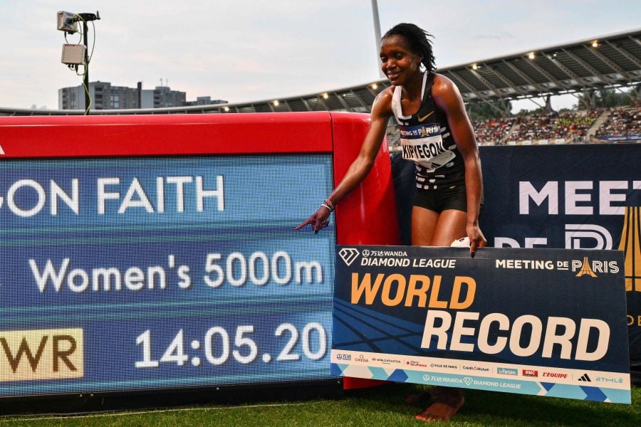 Shocked Kipyegon adds 5,000m world record to 1500m mark in Paris New