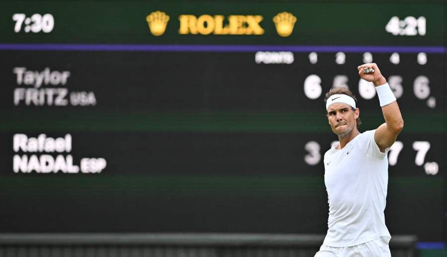 Spain's Rafael Nadal celebrates winning against US player Taylor Fritz during their men's singles quarter final tennis match on the tenth day of the 2022 Wimbledon Championships at The All England Tennis Club in Wimbledon, southwest London. - AFP Pic