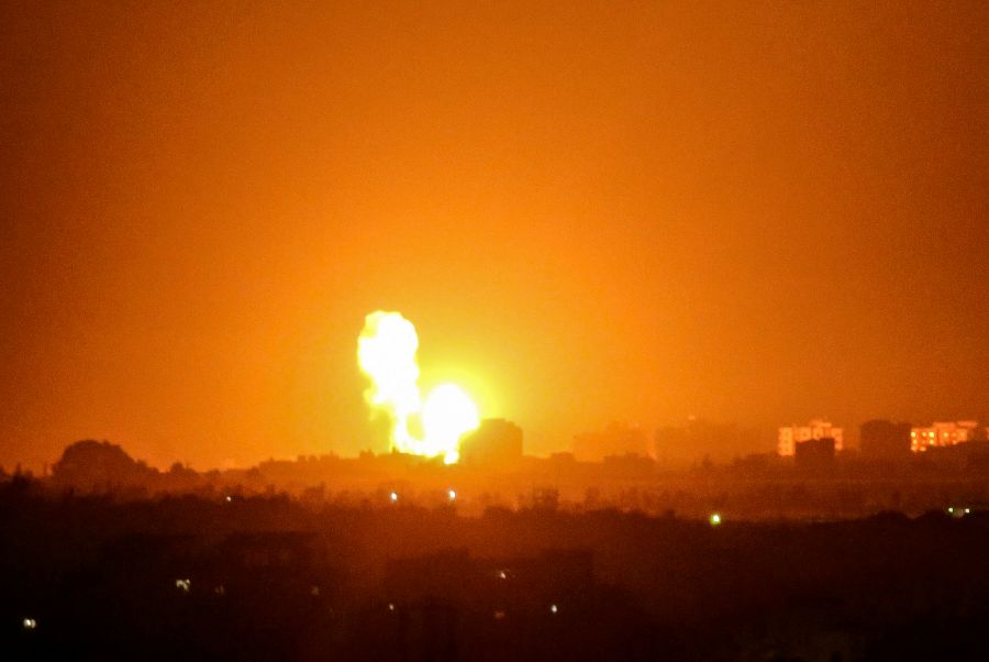 Smoke and flames rise after Israeli army war planes carried out airstrikes over Khan Yunis, Gaza Strip on August 16, 2020. (Photo by SAID KHATIB / AFP)