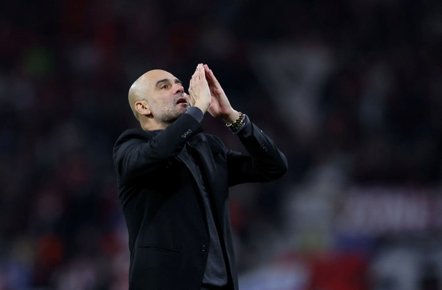Pep Guardiola says Arsenal “are back” as long-term Premier League title rivals ahead of Manchester City’s heavyweight clash at the Emirates Stadium on Sunday. - AFP Pic