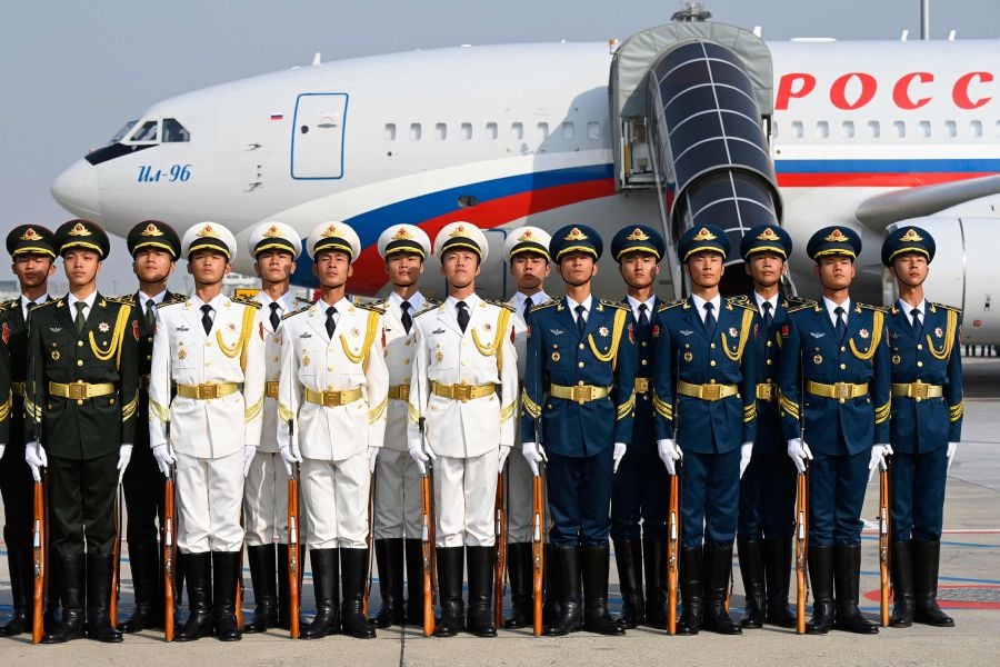 Chinese honor guards are seen after welcoming Russia's President Vladimir Putin ahead of the Third Belt and Road Forum at Beijing Capital International Airport in Beijing on October 17, 2023. - AFP Pic