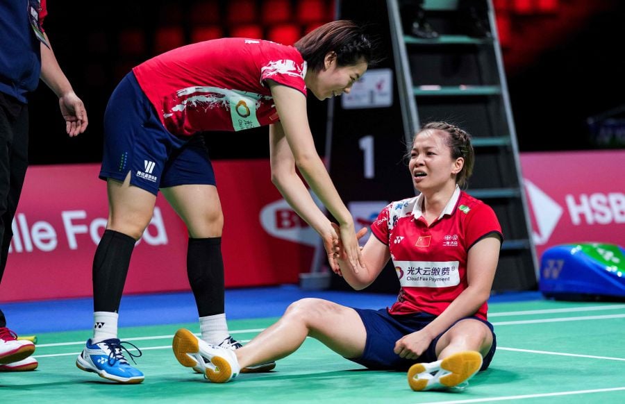 China' Chen Qing Chen reacts as she plays with Jia Yi Fan against Japan's Yuki Fukushima and Mayu Matsumoto during their Uber Cup women's double match in Aarhus, Denmark, on October 16, 2021. - AFP pic
