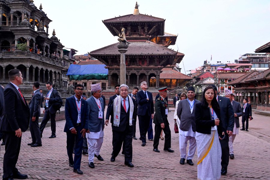  United Nations Secretary General Antonio Guterres (C) visits Patan Durbar Square, a UNESCO world heritage site, during his four-day official visit, in Kathmandu on October 29, 2023. - AFP PIC