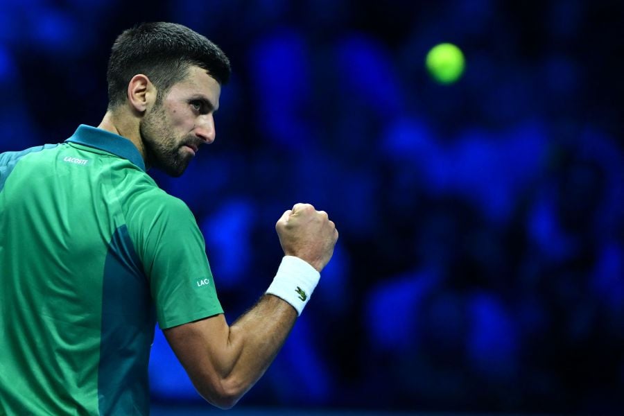 Serbia's Novak Djokovic celebrates a point against Spain's Carlos Alcaraz during their semi-final match at the ATP Finals tennis tournament in Turin on November 18, 2023. - AFP pic
