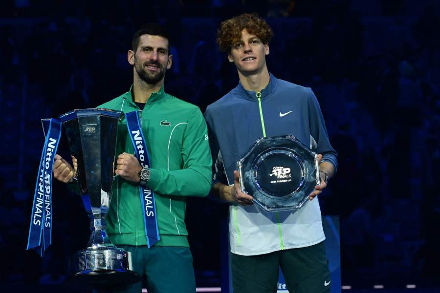 Italy's Jannik Sinner and Serbia's Novak Djokovic pose with their trophy after the final match at the ATP Finals tennis tournament in Turin on November 19, 2023. - AFP Pic