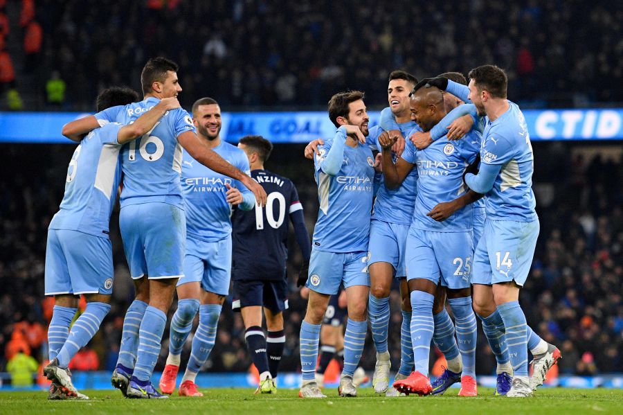Manchester City's Brazilian midfielder Fernandinho (2nd R) celebrates scoring his team's second goal during the English Premier League football match between Manchester City and West Ham United at the Etihad Stadium in Manchester, north west England. - EPA Pic