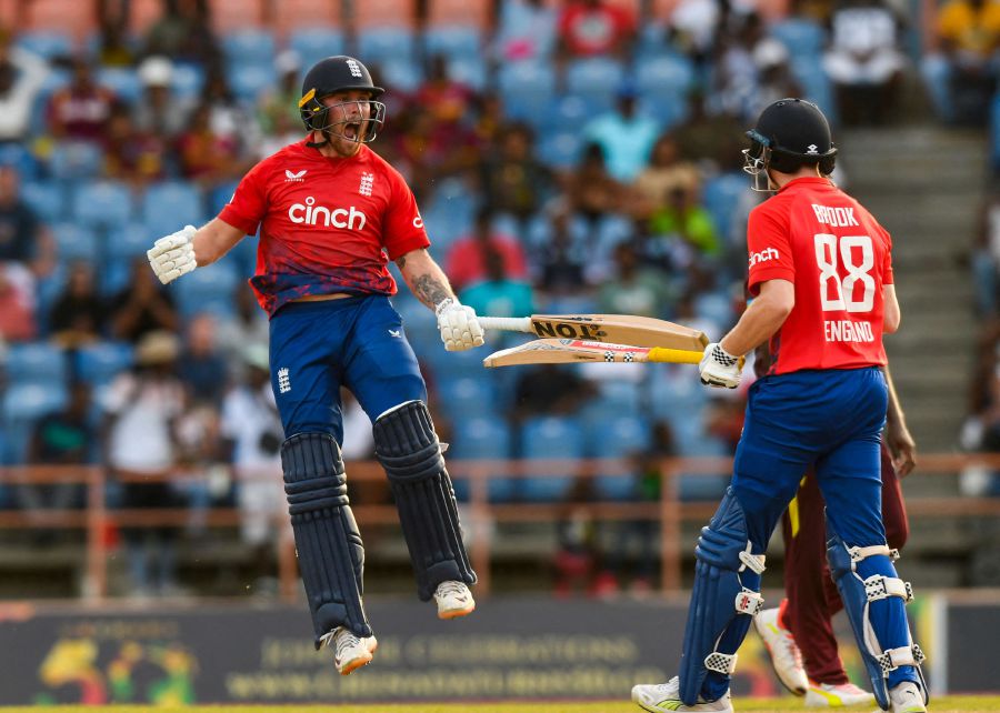 Phil Salt (L) and Harry Brook (R) of England celebrate winning the 3rd T20I between West Indies and England at Grenada National Cricket Stadium, Saint George's, Grenada, on December 16, 2023. - AFP pic