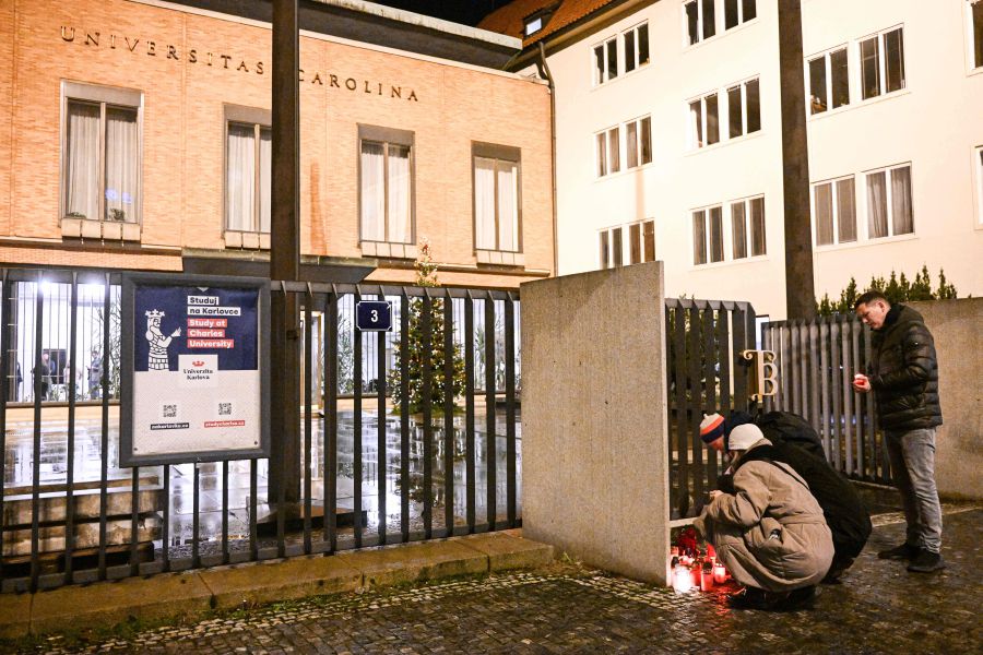 Well wishers light candles for the shooting victims at the Charles University main office in central Prague, on December 21, 2023. The shooting at a university in central Prague that killed more than 15 people was not linked to international terrorism, the Czech government said Thursday.- AFP pic