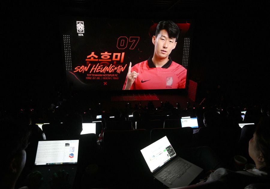 South Korea's national football team player Son Heung-min is seen on a screen during a press conference to announce the South Korean squad for the Asian Cup in Seoul on December 28, 2023.- AFP pic