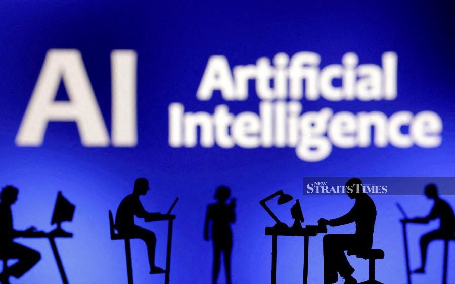 FILE PHOTO: Figurines with computers and smartphones are seen in front of the words "Artificial Intelligence AI" in this illustration taken. REUTERS/Dado Ruvic/Illustration/File Photo/File Photo
