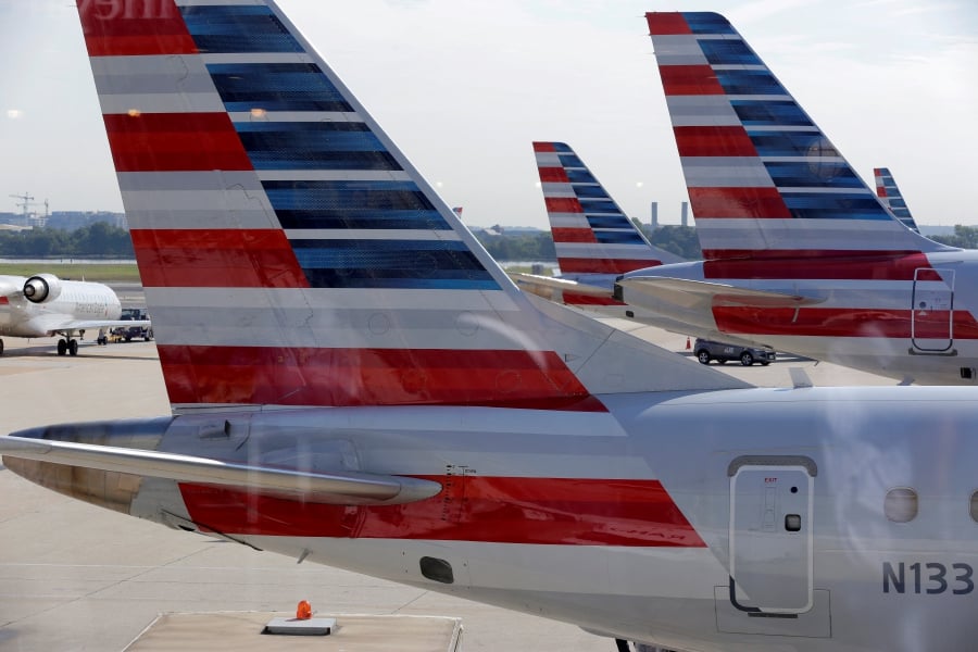 (FILE PHOTO) American Airlines aircraft are parked at Ronald Reagan Washington National Airport in Washington, U.S. (REUTERS/Joshua Roberts/File Photo)