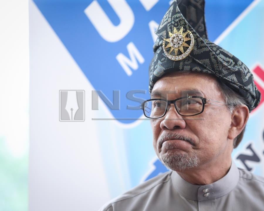 Anwar says he has information that Pas paid RM1mil to settle suit with