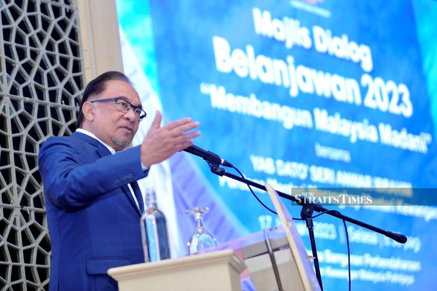 Prime Minister Datuk Seri Anwar Ibrahim speaking at the 2023 Budget Dialogue at the Finance Ministry in Putrajaya yesterday. - NSTP/AIZUDDIN SAAD