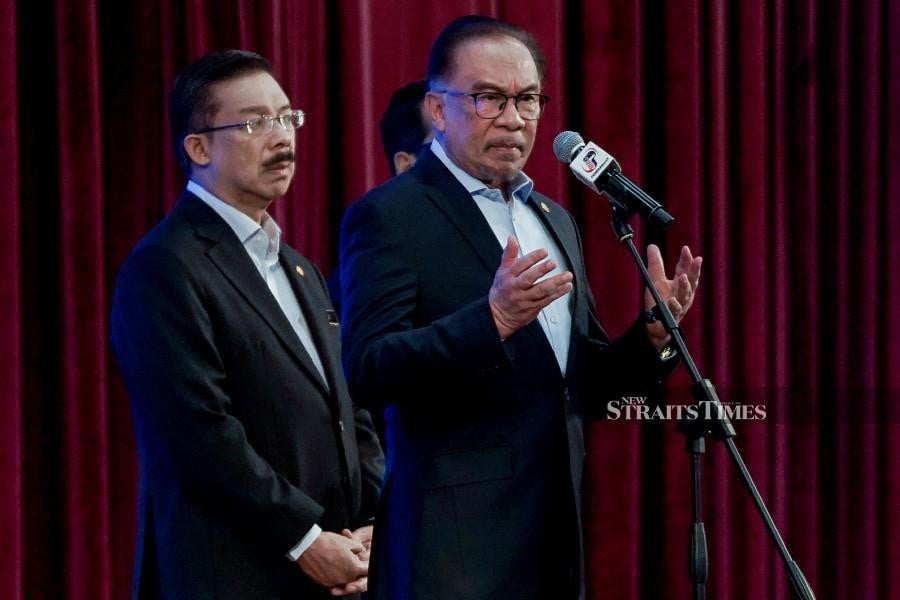 Prime Minister Datuk Seri Anwar Ibrahim addressing staff of the Prime Minister’s Department at its monthly gathering. Also present was Chief Secretary to the Government Tan Sri Mohd Zuki Ali, among others. NSTP/ASYRAF HAMZAH