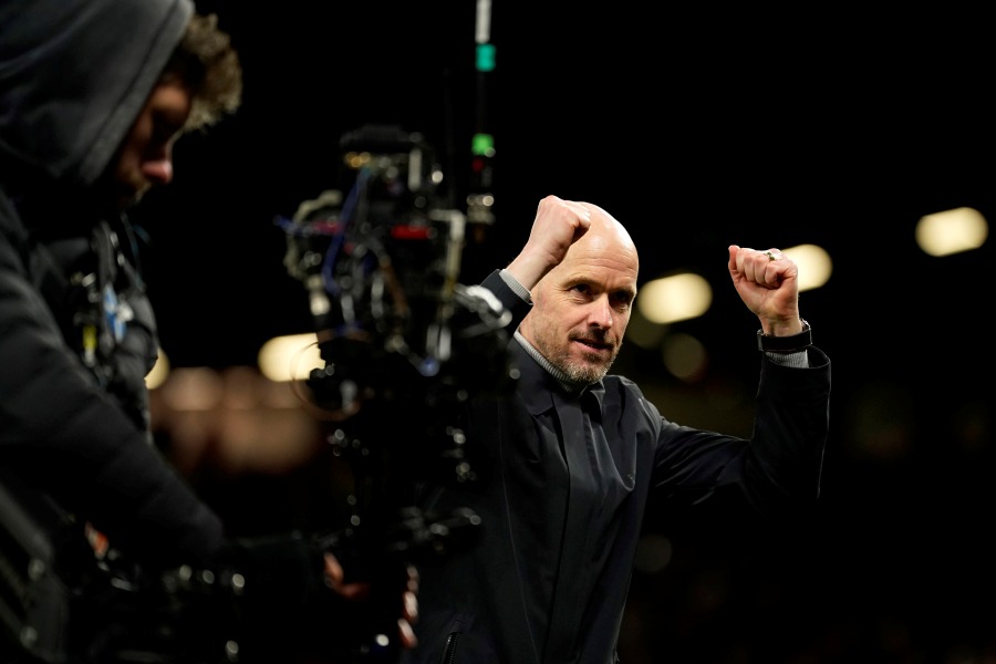 Manchester United's head coach Erik ten Hag applauds fans at the end of the Europa League playoff second leg soccer match between Manchester United and Barcelona at Old Trafford stadium in Manchester. - AP Pic