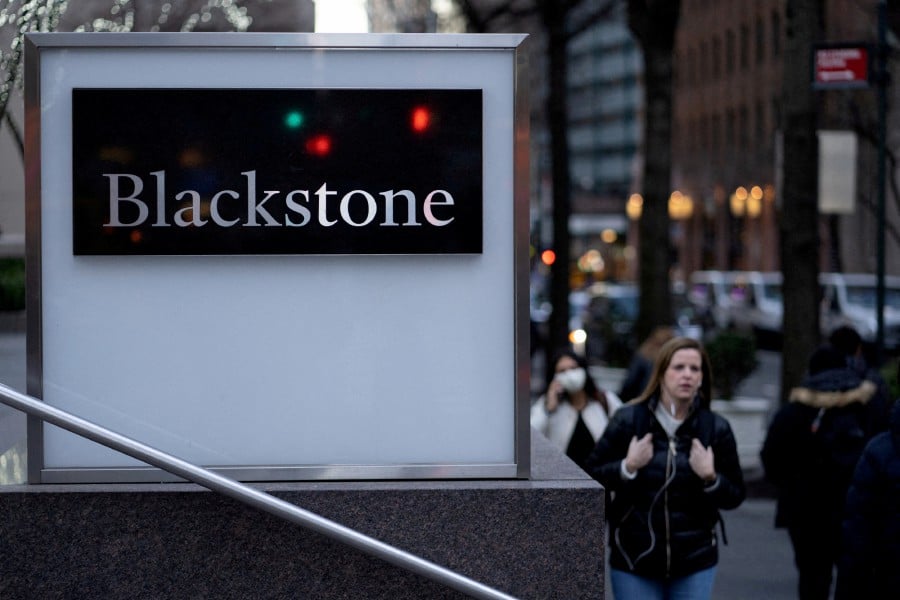 FILE PHOTO: Signage is seen outside the Blackstone Group headquarters in New York City, U.S., January 18, 2023. REUTERS/Jeenah Moon/File Photo