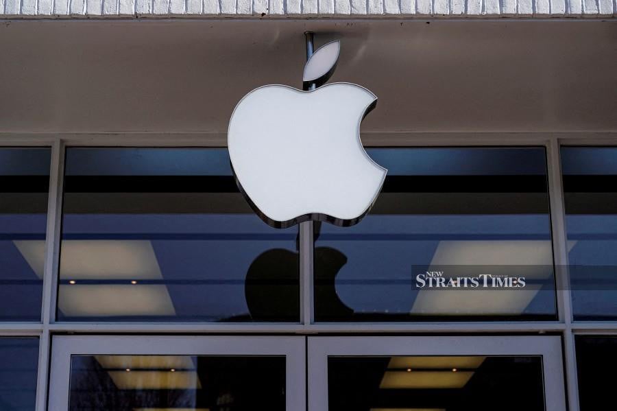 Logo of an Apple store is seen as Apple Inc. REUTERS/Joshua Roberts/File Photo