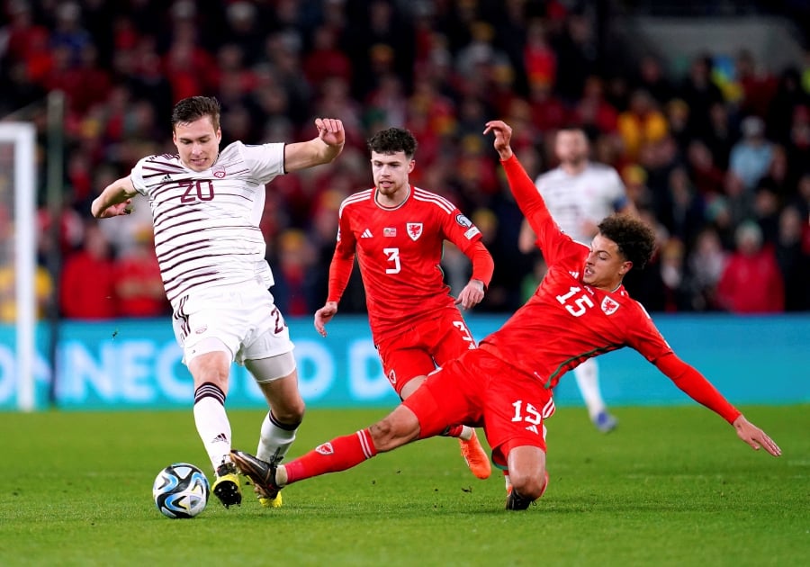 Moore lifts Wales to 10 Euro qualifying win over Latvia New Straits
