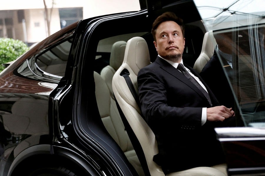  Tesla CEO will be accompanied by other executives during his visit, said the first source. REUTERS/Tingshu Wang/File Photo
