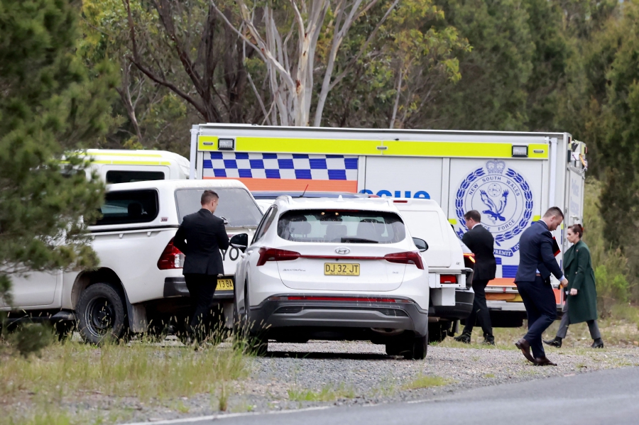 Australian police found the bodies of a TV presenter and his flight attendant boyfriend in a rural area outside Sydney on February 27, acting on information from a police officer charged with their murder. (Photo by HILARY WARDHAUGH / AFP)
