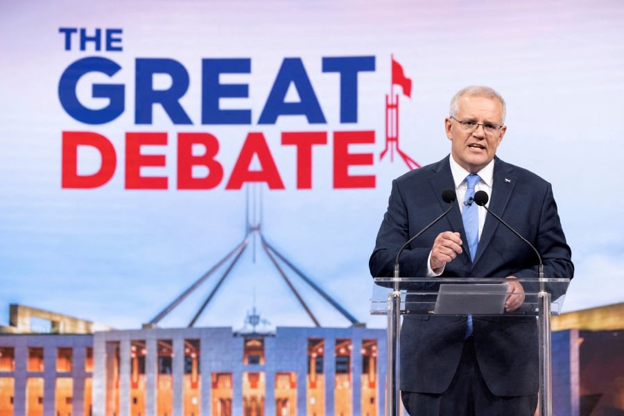 FILE PHOTO: Australian Prime Minister Scott Morrison speaks during the second leaders' debate of the 2022 federal election campaign at the Nine studio in Sydney, Australia May 8, 2022. - REUTERS pic