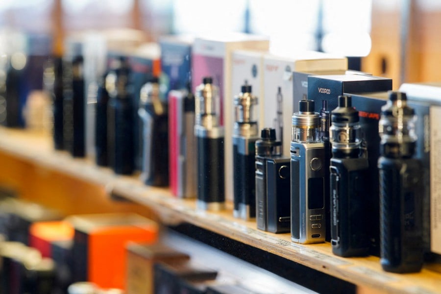 Vape pens stand in a display cabinet at a vape store, in Melbourne, Australia, May 2, 2023. REUTERS FILE PIC