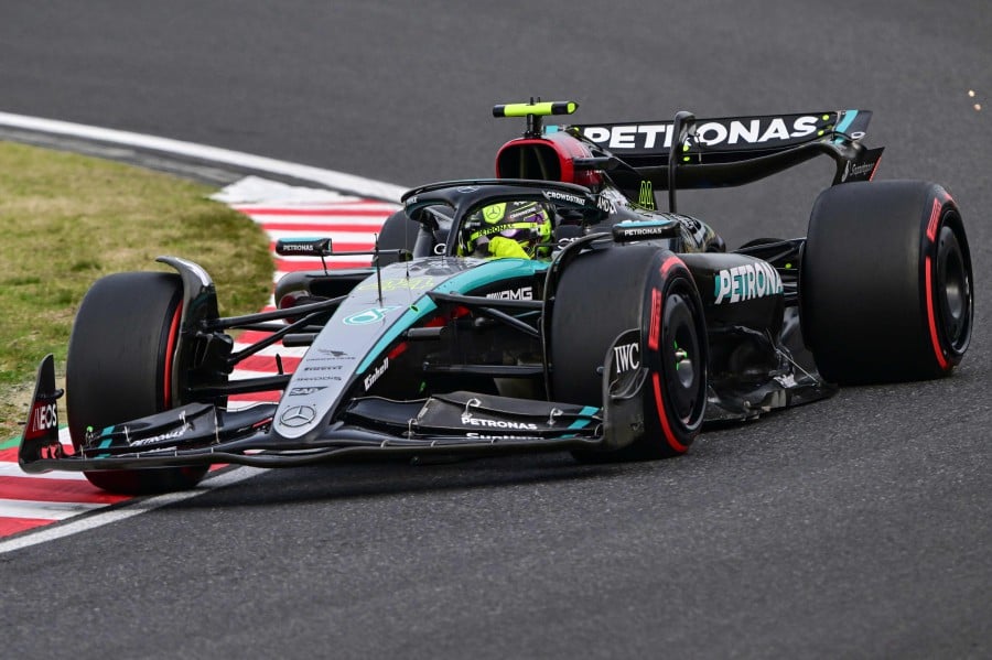 Mercedes' British driver Lewis Hamilton takes part in the qualifying session for the Formula One Japanese Grand Prix race at the Suzuka circuit in Suzuka, Mie prefecture on April 6, 2024. - AFP pic