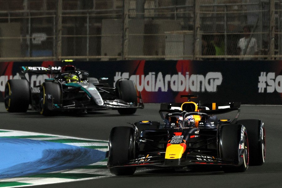 Red Bull Racing's Dutch driver Max Verstappen (R) and Mercedes' British driver Lewis Hamilton compete during the Saudi Arabian Formula One Grand Prix at the Jeddah Corniche Circuit in Jeddah on March 9. - AFP PIC