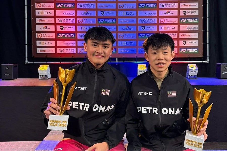 Aaron Tai and Kang Khai Xing (left) celebrating after winning the boys’ doubles title at the Dutch Junior International in Haarlem on Sunday. - Pic courtesy from BAM 