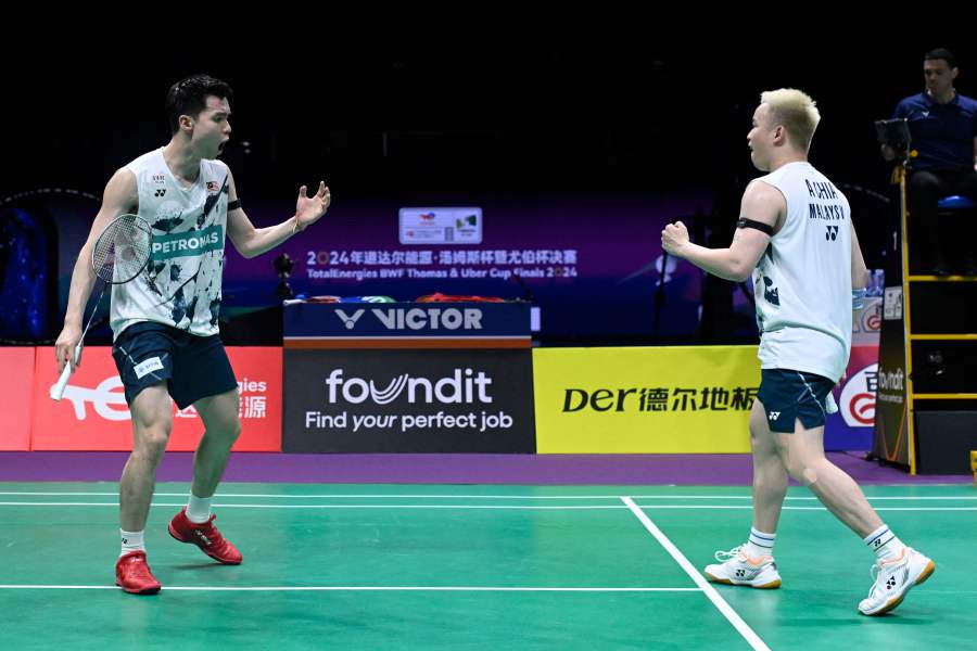 Malaysians continue to rally behind the national doubles pair Aaron Chia and Soh Wooi Yik, who lost 3-1 to China in the Thomas Cup semi-finals on Saturday. - AFP pic
