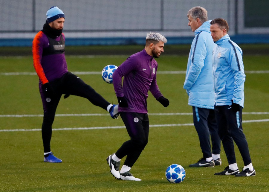 Manchester City's Sergio Aguero (centre) is expected to return to action against Everton. - Reuters
