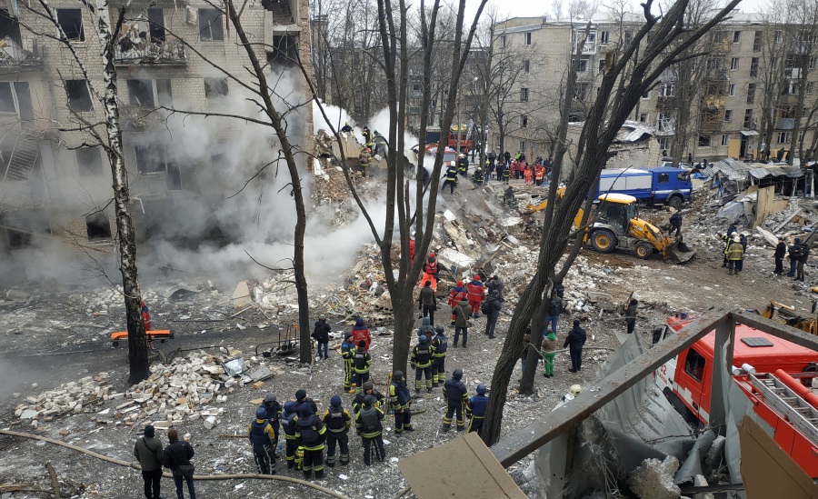 Rescuers work at a site of a residential building heavily damaged during a Russian missile attack, amid Russia's attack on Ukraine, in Kharkiv, Ukraine January 23, 2024.- REUTERS pic